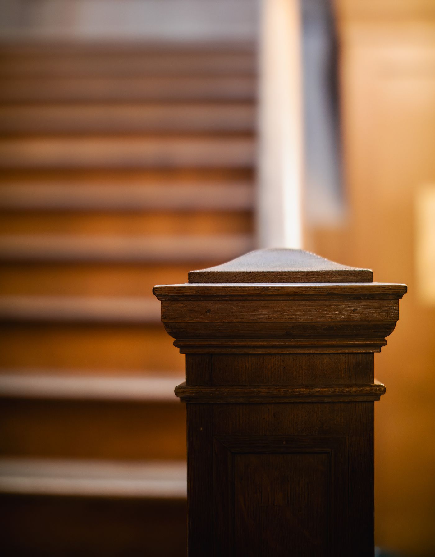 Close detail of a staircase newel post
